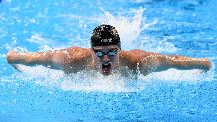 Jack Conger was among the Olympians who claimed their taxi was stopped by armed men who robbed the swimmers.