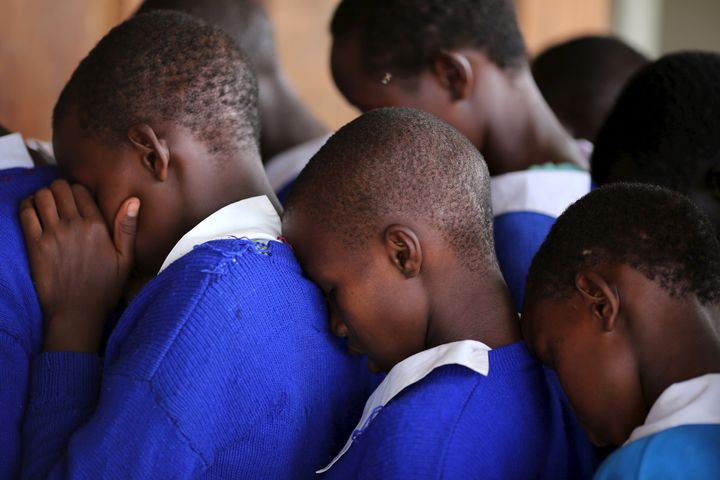 Students rehearse a poem that they will have to perform to an audience, moments before the start of a social event advocating against harmful practices such as Female Genital Mutilation (FGM) at the Imbirikani Girls High School in Imbirikani, Kenya, April 21, 2016.