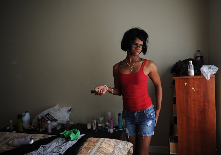 Sarah Feliciano prepares for her morning shower at the Wanda Alston House on May 18, 2011, in Washington, D.C. Sarah was living at DC's National Airport when an airport employee told her about the transitional home specifically for homeless LGBT youth ages 16 to 24 -- it's the only one of its kind in DC.