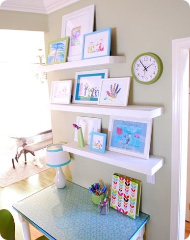 <a href="http://centsationalgirl.com/2011/01/playroom-art-gallery-wall/" target="_blank">image source: centsationalgirl.com</a>