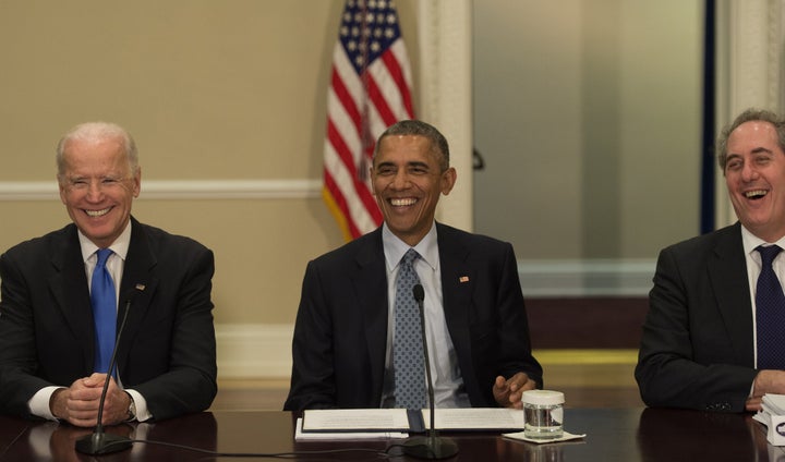President Barack Obama alongside Vice President Joe Biden and U.S. Trade Representative Michael Froman (R). Froman led White