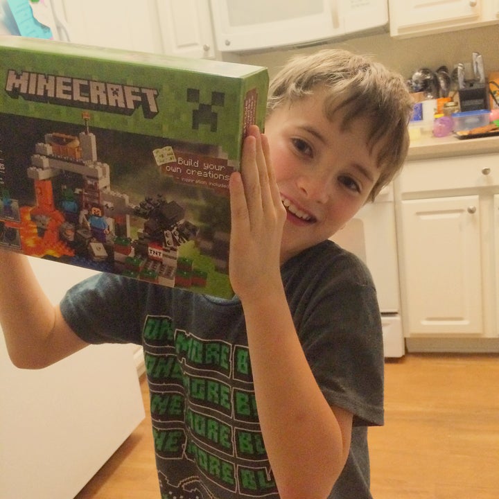 Ryan with a Minecraft birthday present.