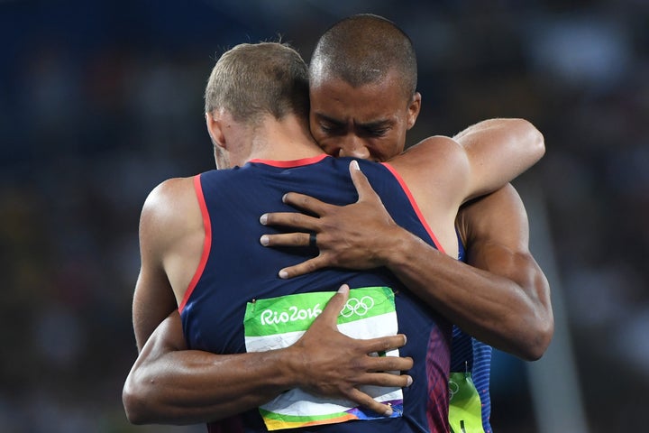 USA's Ashton Eaton celebrates with silver medallist France's Kevin Mayer after he won the Men's Decathlon during the athletics event at the Rio 2016 Olympic Games in Rio de Janeiro on August 18, 2016.