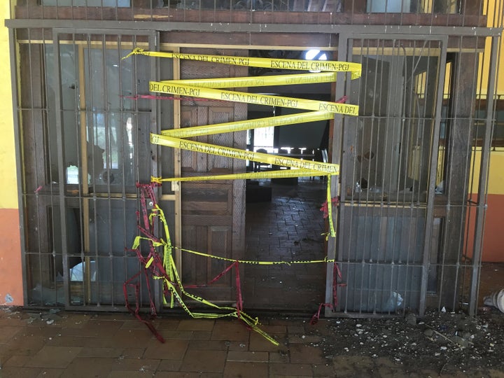 Police tape is seen at a ranch where 42 men died after a firefight of armed civilians with federal forces in the violent western state of Michoacan, Mexico, in May 2015. 