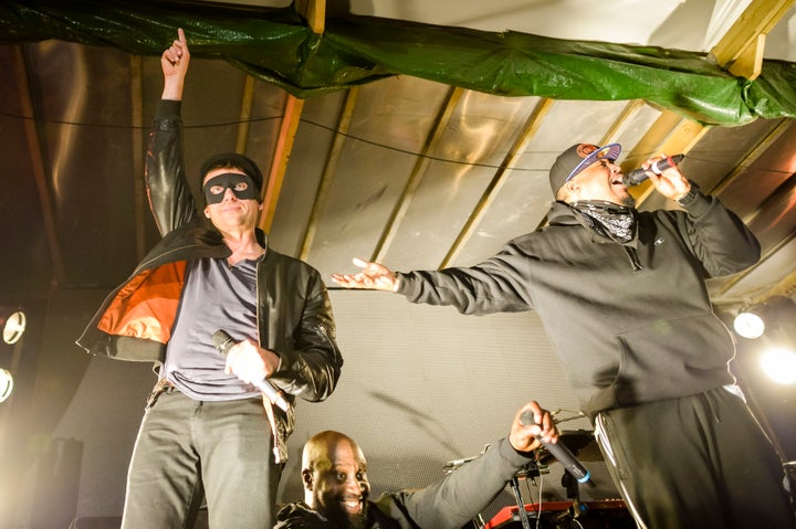 Blur's Damon Albarn joined De La Soul on stage during a concert at Banksy's Dismaland.