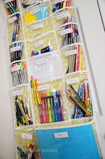 <a href="http://www.abowlfulloflemons.net/2012/01/over-door-school-supplies-organizer.html" target="_blank">image source: abowlfulloflemons.net</a>