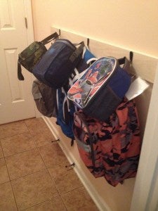 <a href="http://www.chaos2peace.com/easy-backpack-storage/" target="_blank">image source: chaos2peace.com</a>