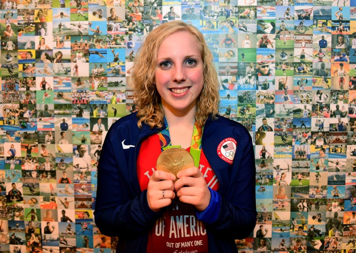 Thrasher poses with her gold medal at the USA House in Rio.