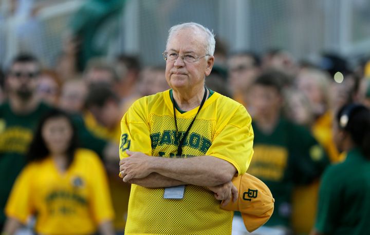 Baylor President Ken Starr waits to run onto the field defore an NCAA college football game in Waco, Texas.