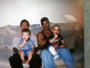 Michael Paul and his brother, John, hold their sons in their laps and enjoy each other's company. John, a Missouri resident, considered his big brother his best friend and struggles to accept his unexplainable death.