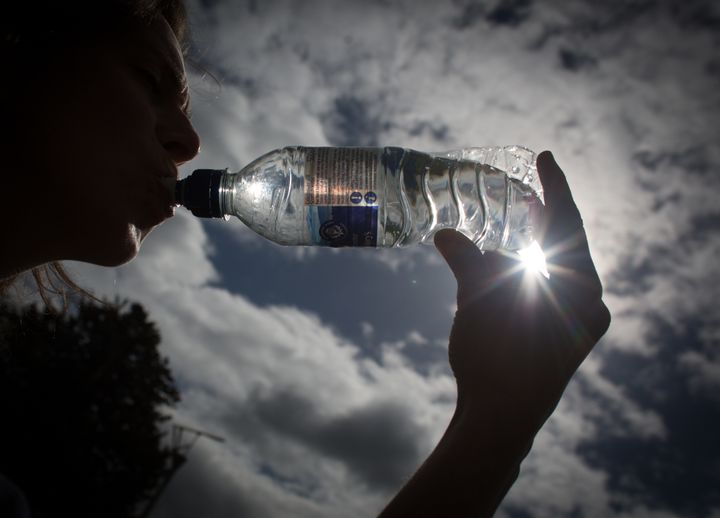 Bottled water sales in the U.S. just surpassed soda sales for the first time. There is a dark side to all those plastic bottles.