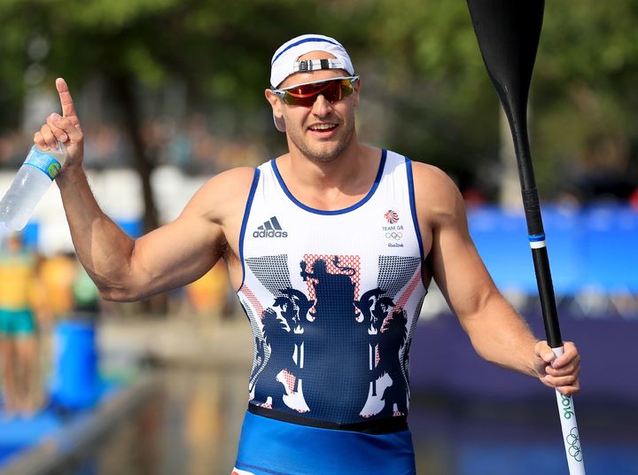 Great Britain's Liam Heath celebrates winning gold in the men's 200m kayak single