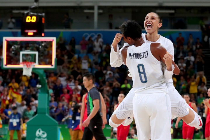 Angel Mccoughtry and Diana Taurasi celebrate after winning the Women's Gold Medal Game in Rio de Janeiro, Brazil.