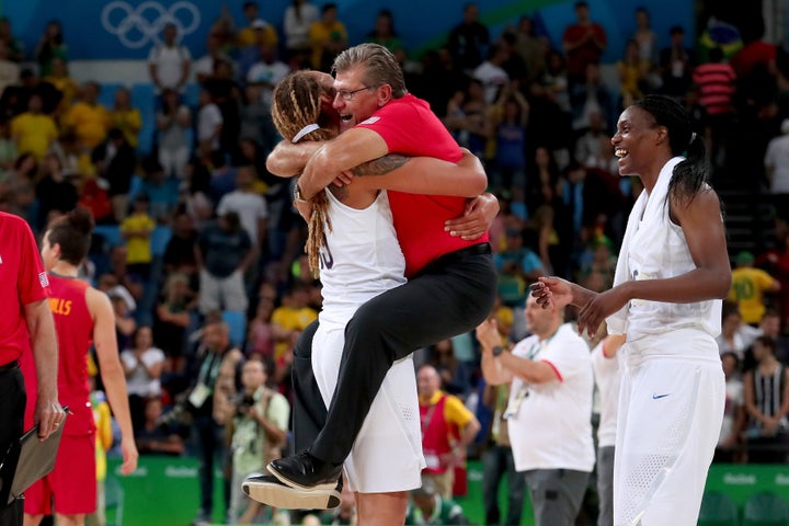 Brittney Griner hugs Geno Auriemma after winning the Women's Gold Medal Game in Rio de Janeiro, Brazil.