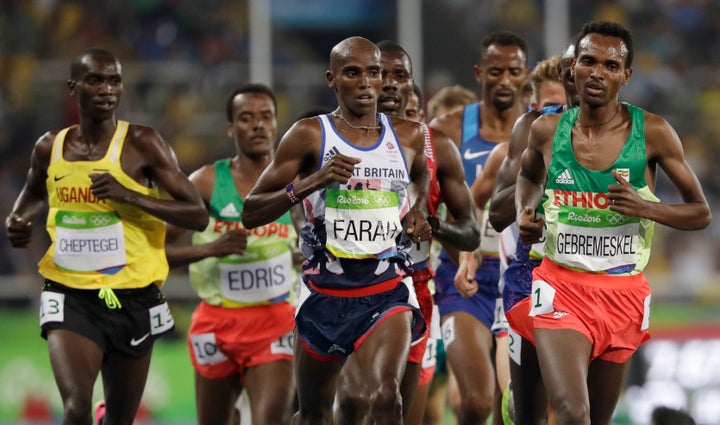 Farah pictured neck-and-neck with Ethiopia's Dejen Gebremeskel