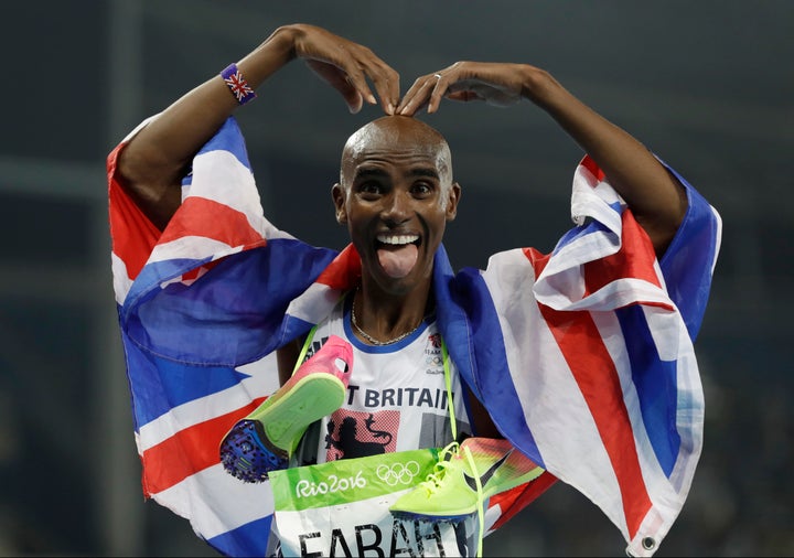 <strong>Farah adopted his famous pose after the historic win</strong>