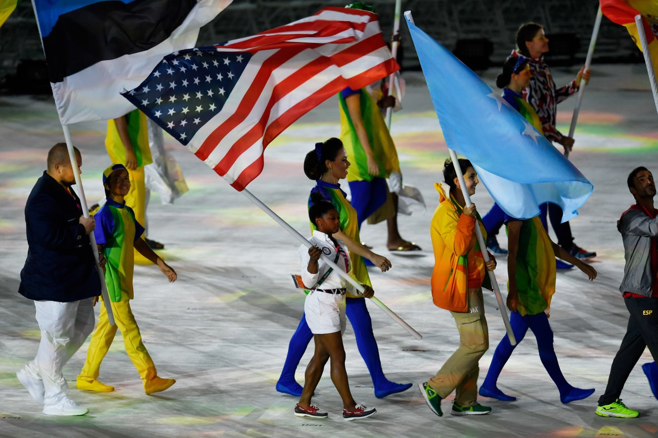 Simone Biles parades during the closing ceremony of the Rio 2016 Olympic Games at the Maracana stadium in Rio de Janeiro on August 21, 2016.