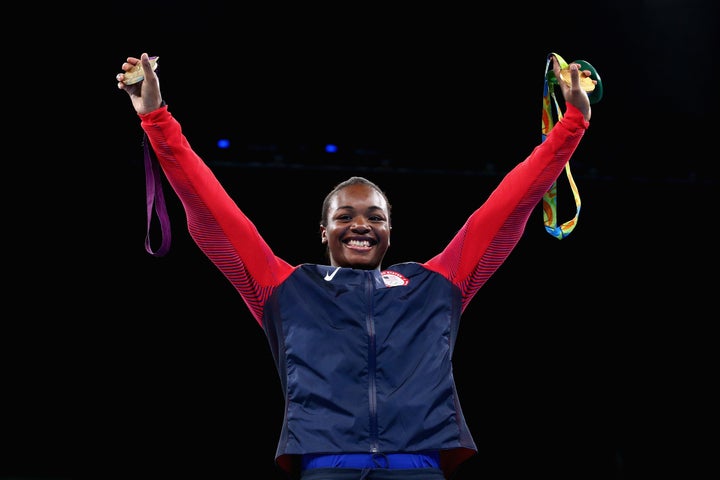 Gold medalist Claressa Maria Shields of the United States poses on the podium during the medal ceremony for the Women's Boxing Middle. 