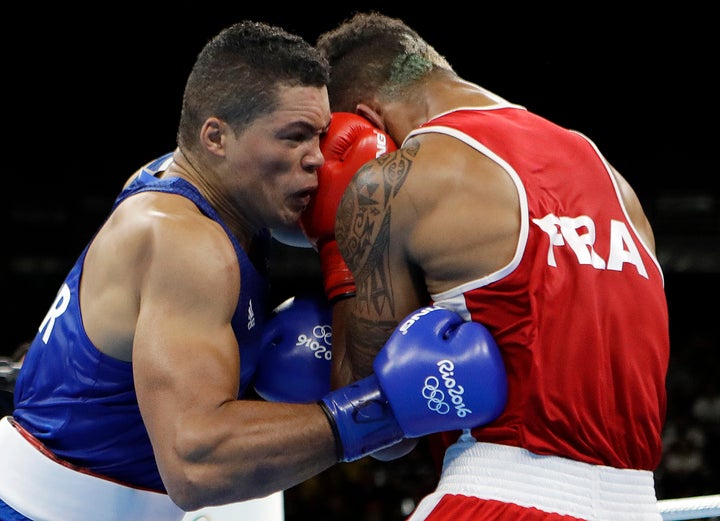 British boxer Joe Joyce, left, lost out to France's Tony Yoka in the men's super heavyweight final.