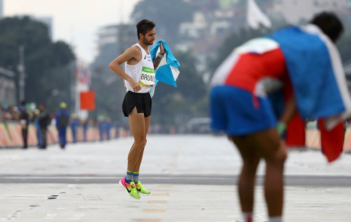 Argentinian Federico Bruno hobbled over the finishing line of the men's marathon on Sunday after getting severe cramp.