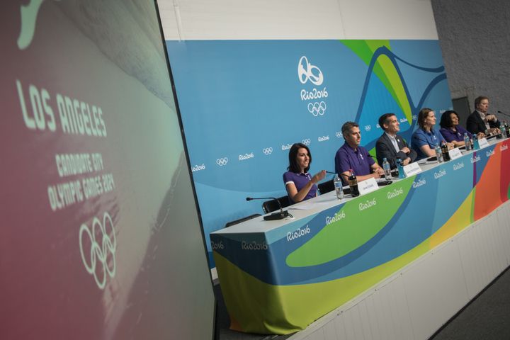 L.A.'s campaign to host the 2024 Games continued at a Rio press conference, but the United States' push for doping sanctions against Russia could reportedly hurt the bid.