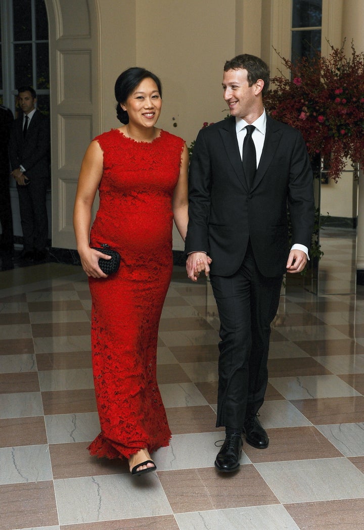 Mark Zuckerberg, Chairman and CEO of Facebook, and his wife Priscilla Chan arrive for the official State dinner for Chinese President Xi Jinping and his wife Peng Liyuan at the White House in Washington, September 25, 2015.