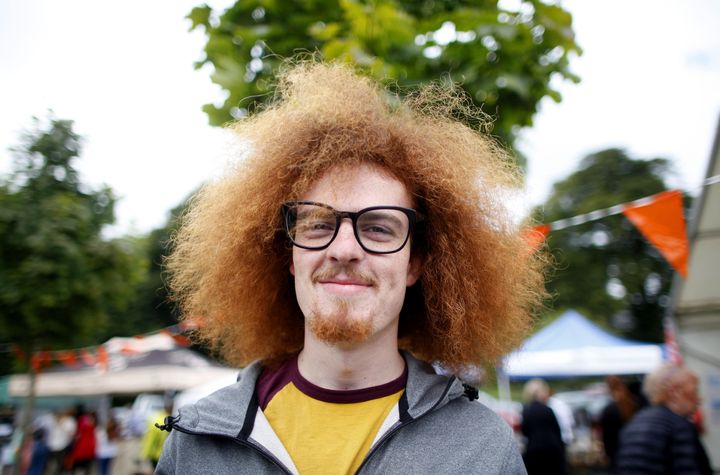 A Canadian festival-goer waits for judges to evaluate his hair, 2016.