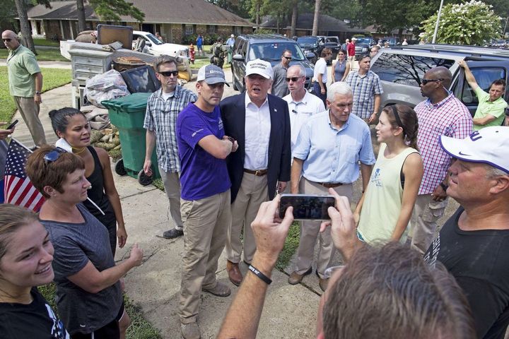 Donald Trump and running mate Mike Pence meet with flood victims in Denham Springs, La.