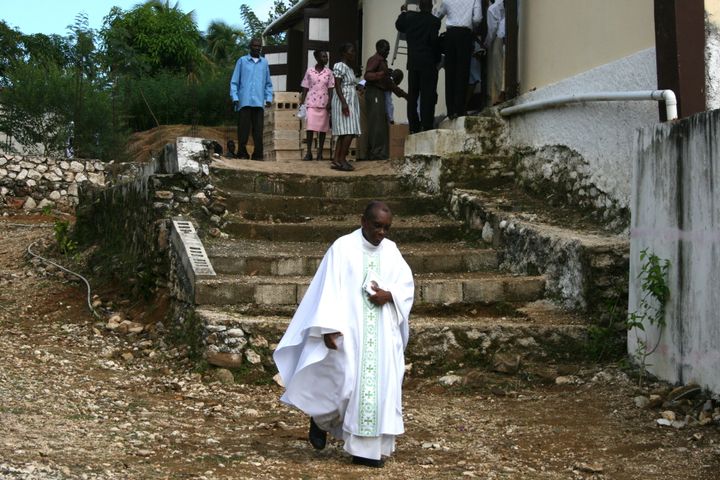 Father Joseph leaving Mass.