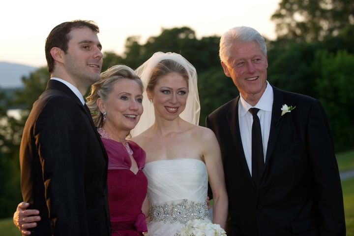 Bride Chelsea Clinton poses with her new husband Marc Mezvinsky and parents Bill and Hillary Clinton. 