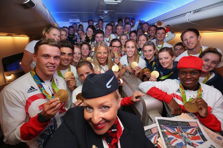 <strong>Team GB gold medalists pose for a selfie with BA cabin crew</strong>
