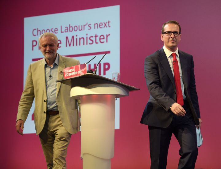 Jeremy Corbyn and Owen Smith walk off the stage after the first Labour Leadership debate at the All Nations Centre, Cardiff.