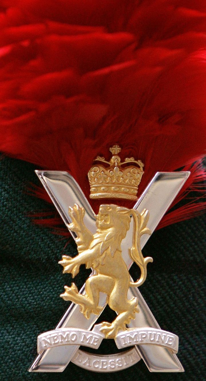 A cap badge for the Royal Regiment of Scotland