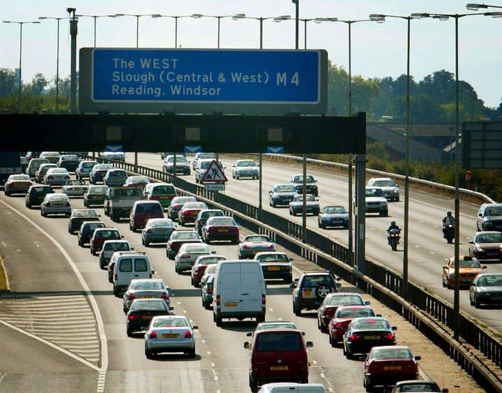 Queues of traffic head west on the M4 motorway just outside London as people head out of the capital during a previous bank holiday weekend
