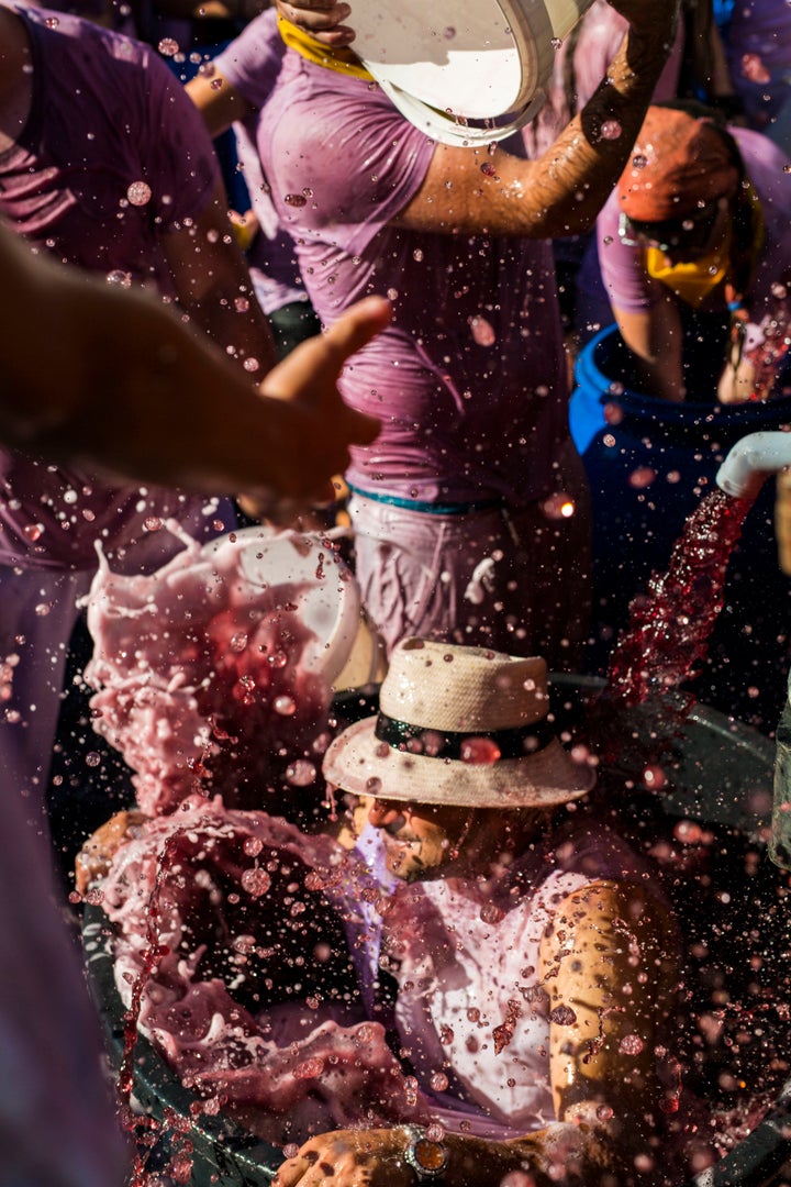 Women throw their bras up in the air during the 6th edition of the News  Photo - Getty Images