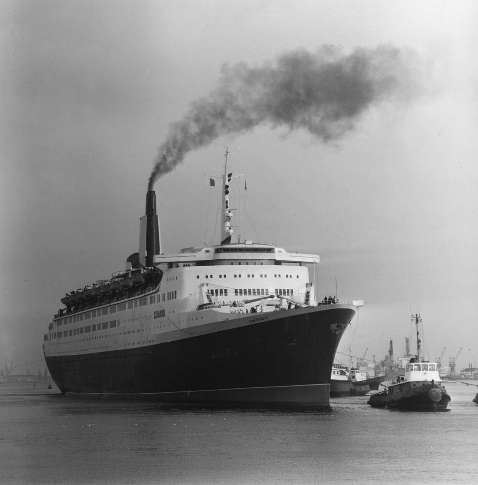 The QE2 and tugs heading&nbsp;to Southampton, England.