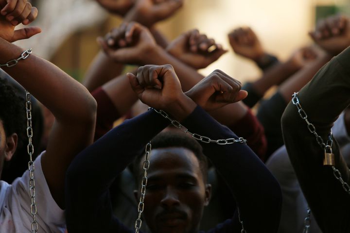 Ethiopian migrants, all members of the Oromo community of Ethiopia living in Malta, protest against the Ethiopian regime in Valletta, Malta, on Dec. 21, 2015.