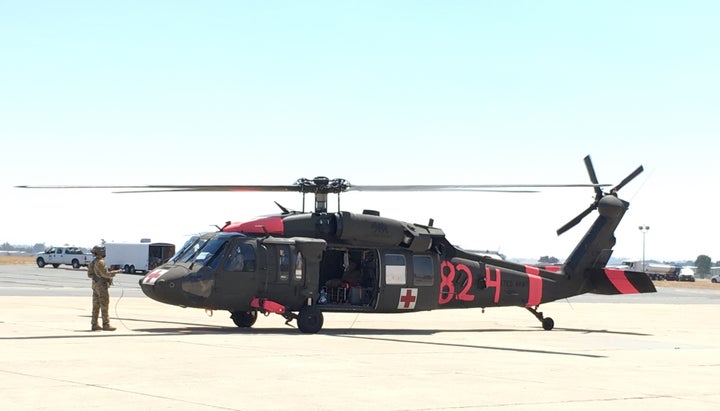 UH-60 Blackhawk MEDEVAC helicopter, painted for Cal Fire missions, on the ground in Paso Robles.