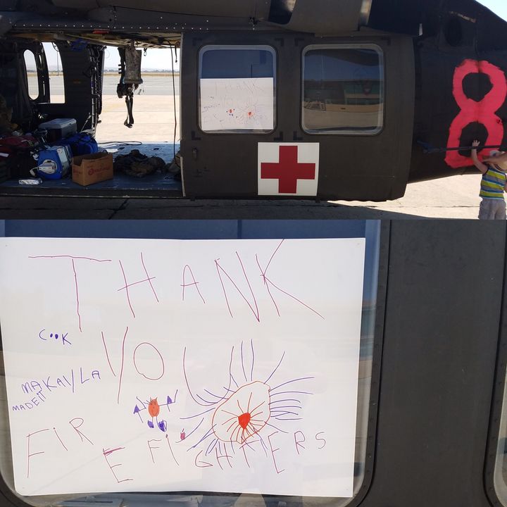 The MEDEVAC helicopter carrying a "Thank you" provided by local children.