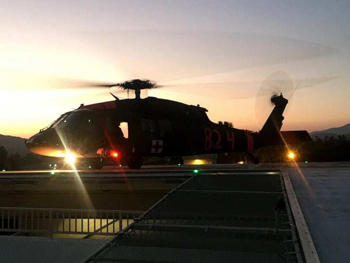 UH-60 MEDEVAC helicopter on the helipad at Sierra Vista Regional Medical Hospital at dusk