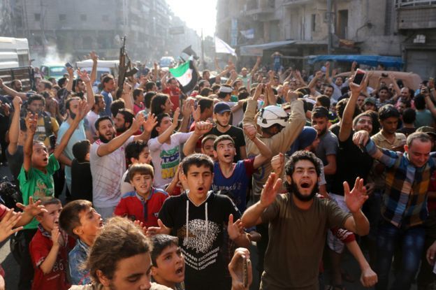 Syrians gathered in the streets in Aleppo in celebration after rebels broke the Assad regime led siege