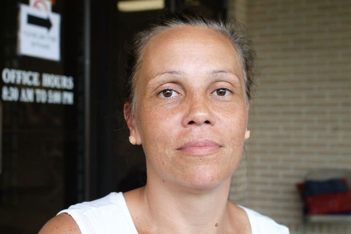 Della Mcarter swam through floodwaters to get back to her kids.