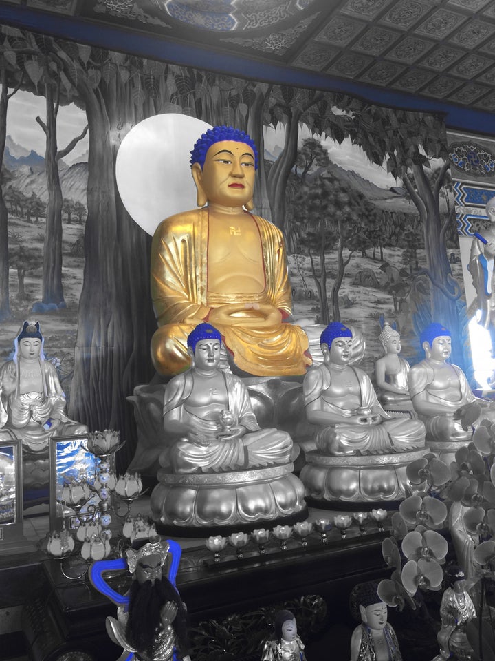 Some of the Buddhas in a temple. Edited with Vivv App.