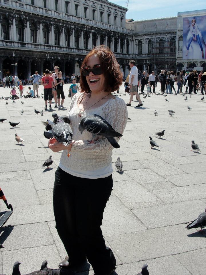 <p><em>Laurita enjoys a spontaneous moment while visiting Venice, Italy in May 2012.</em></p>
