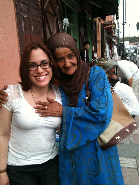 Laurita poses with a local woman while visiting Marrakech, Morocco in May 2012.