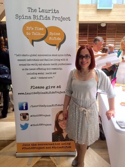 Laurita poses for a photo op during the April 2016 launch of The Laurita Spina Bifida Project in Miami. 
