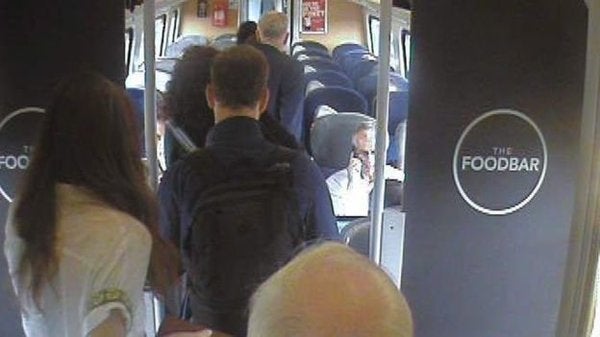 Corbyn, seen here in a navy blue jacket, was seen ignoring seemingly empty, unreserved seats