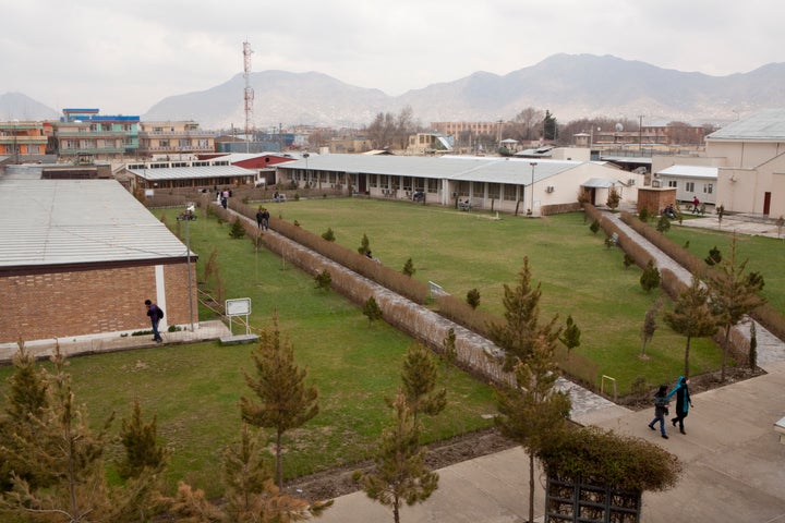 Students walk through campus at the American University of Kabul on March 31, 2012 in Kabul, Afghanistan.