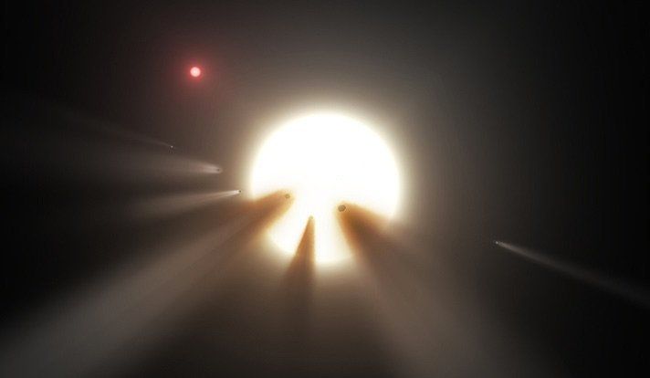 Artist's depiction of KIC 8462852, a.k.a. "Tabby's Star," showing a swarm of comets blocking its light.