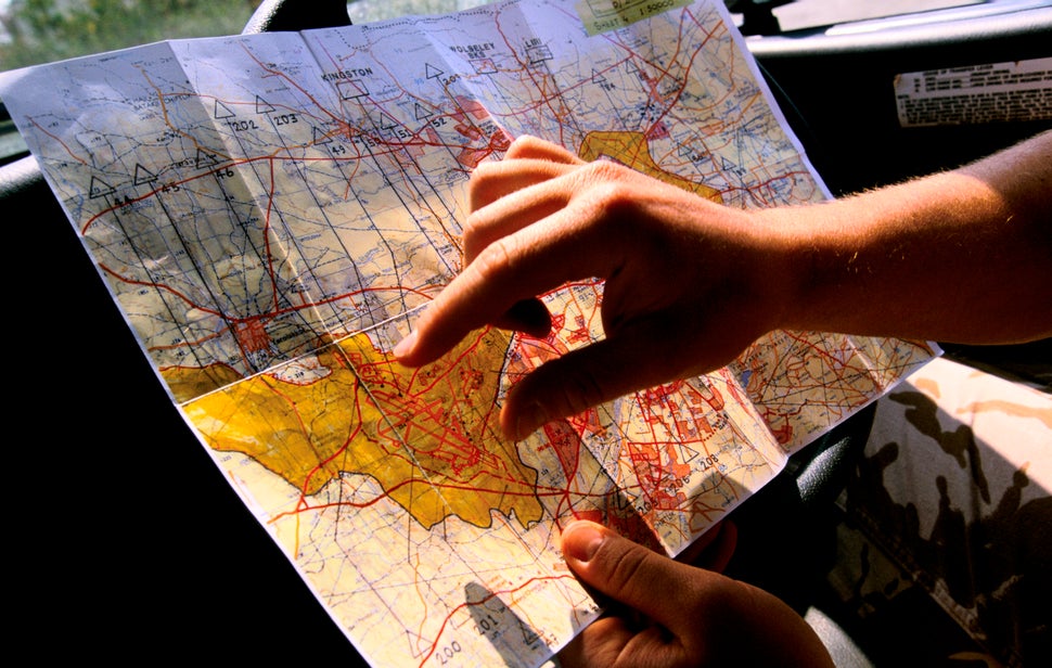 U.N. peacekeepers examine a map showing the Green Line, the border between northern Cyprus and southern Cyprus.